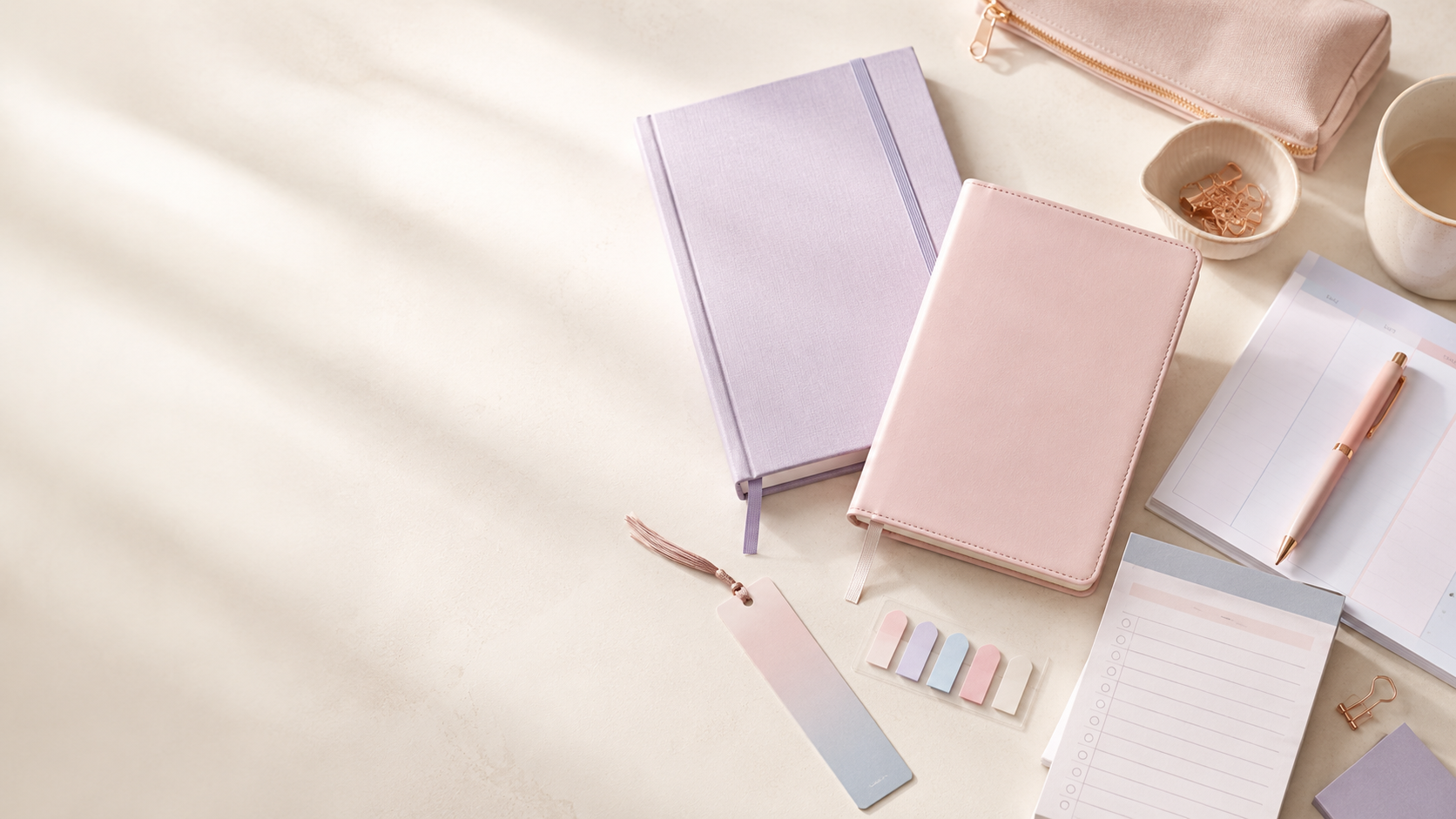 Momsora lilac and blush planners with sticky tabs, a bookmark and a rose-gold pen